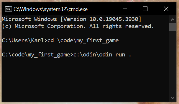 Using the commandline to compile the program. Shows two commands being executed: cd \code\my_first_game followed by c:\odin\odin run .